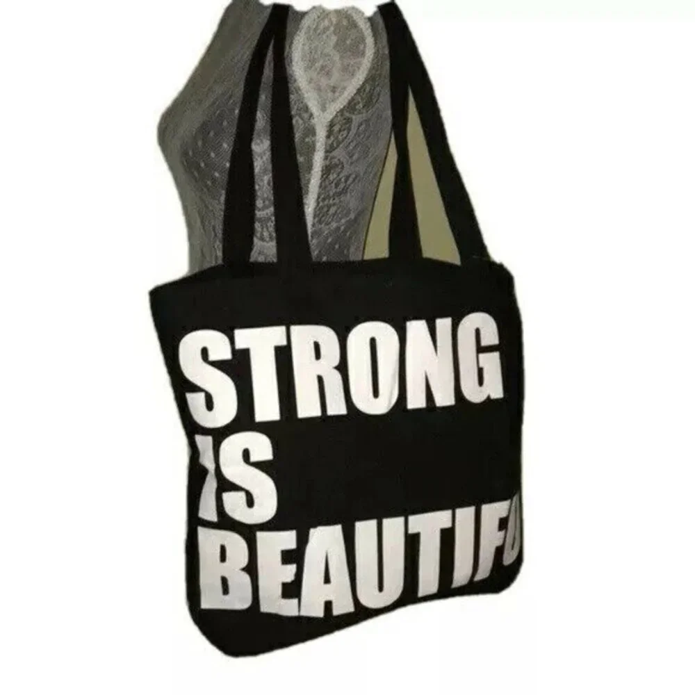 Layer 8 Studio Tote bag Black Strong is Beautifull